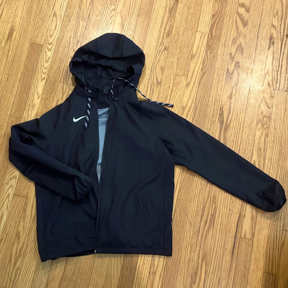 Black Nike women’s training full zip jacket. hood rolls into zipper, large